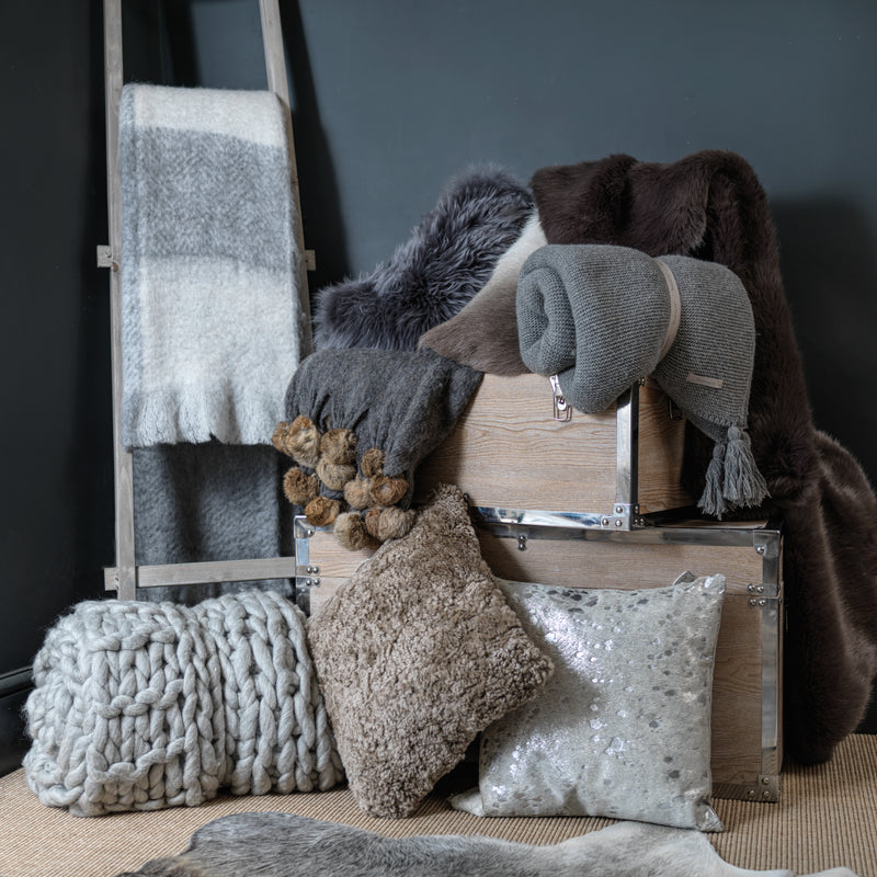knit throws, wool throws and throw pillows from cotswold luxe interiors