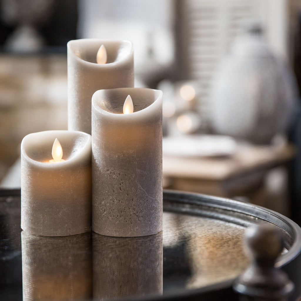 flameless flickering candles displayed on a mirrored tray at cotswold luxe interiors